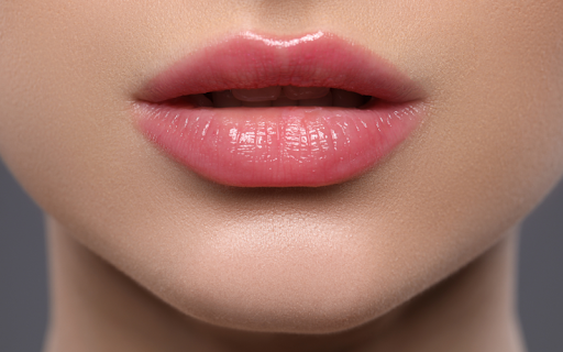 Fully healed blush pink lip with a smooth