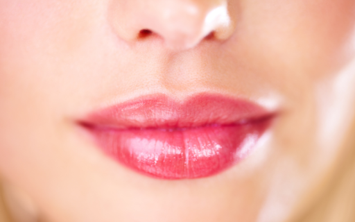 Close-up of lips with a soft, natural tint after a modern lip tattoo session